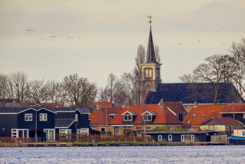 Holiday resort houses Terherne. Lakeside View of Holiday resort village Terherne at Sneekermeer Friesland stock photos Holiday resort houses Terherne. Lakeside View of Holiday resort village Terherne at Sneekermeer Friesland stock photos
