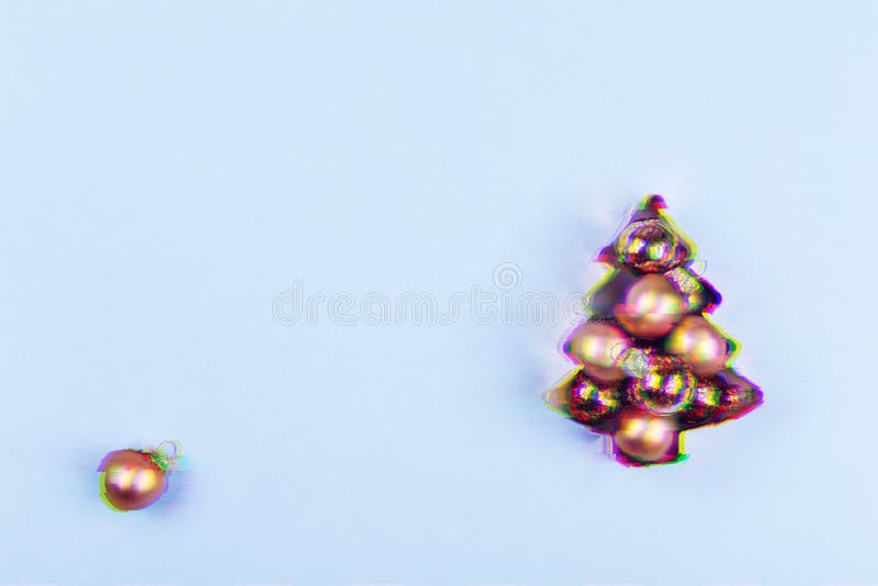 Holiday tree copper cookie cutter full of rose gold rounds on blue background. Holiday, Christmas and New Year concept. Cozy homey stock image Holiday tree copper cookie cutter full of rose gold rounds on blue background. Holiday, Christmas and New Year concept. Cozy homey stock image