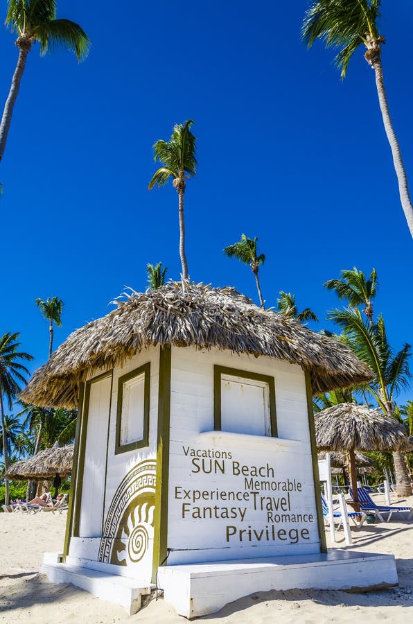 Holidays cottage with a thatched roof on beach