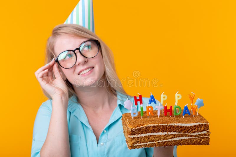 Holidays and Party Cocept - Positive Young Woman Holding a Happy ...