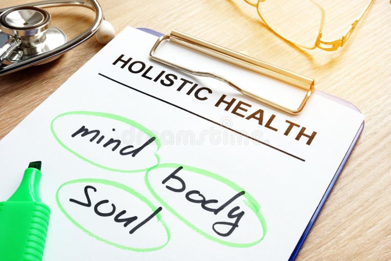 Clipboard with Holistic health and words mind, body and soul. Clipboard with Holistic health and words mind, body and soul.