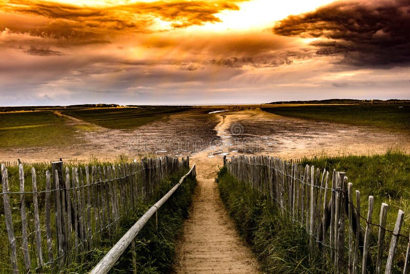 Holkhamstrand bij zonsondergang stock foto Holkhamstrand bij zonsondergang stock foto