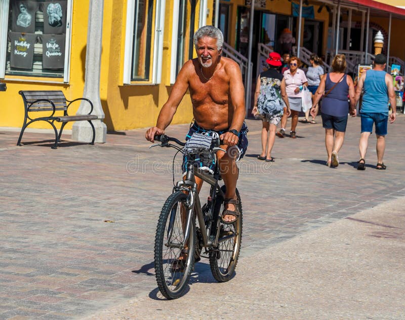 Bicycle rider at the Hollywood Beach Broadwalk in South Florida royalty free stock image Bicycle rider at the Hollywood Beach Broadwalk in South Florida royalty free stock image