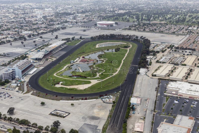 Inglewood, California, USA - March 22, 2014: Aerial of historic Hollywood Park race track which recently closed to make way for 3000 home mixed use development. Inglewood, California, USA - March 22, 2014: Aerial of historic Hollywood Park race track which recently closed to make way for 3000 home mixed use development.