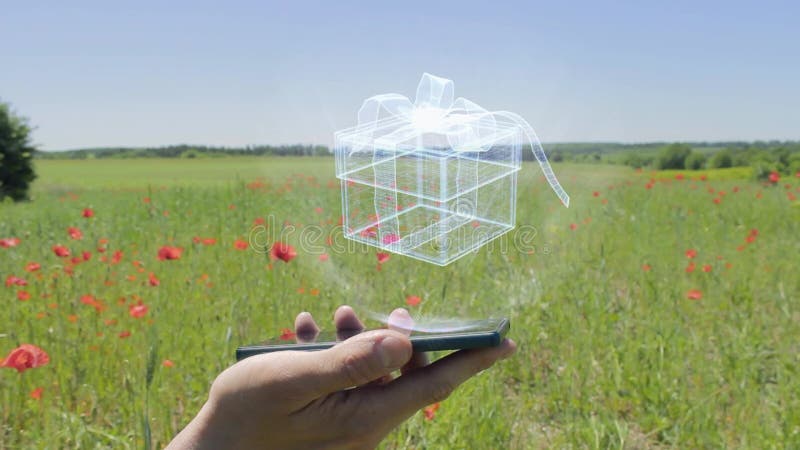 Hologramm der Geschenkbox auf einem Smartphone