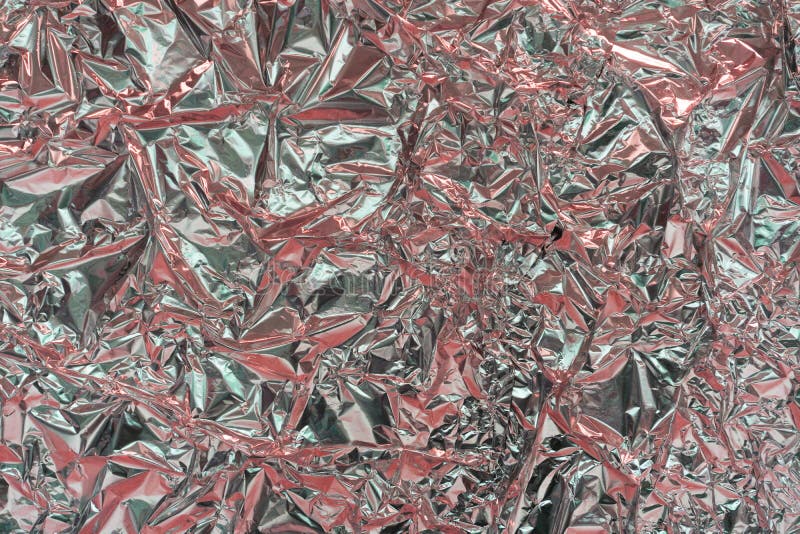 Holographic texture wrinkled metal foil. Hologram abstract 80s style background with blue, purple and silver colors. Texture of stock images Holographic texture wrinkled metal foil. Hologram abstract 80s style background with blue, purple and silver colors. Texture of stock images