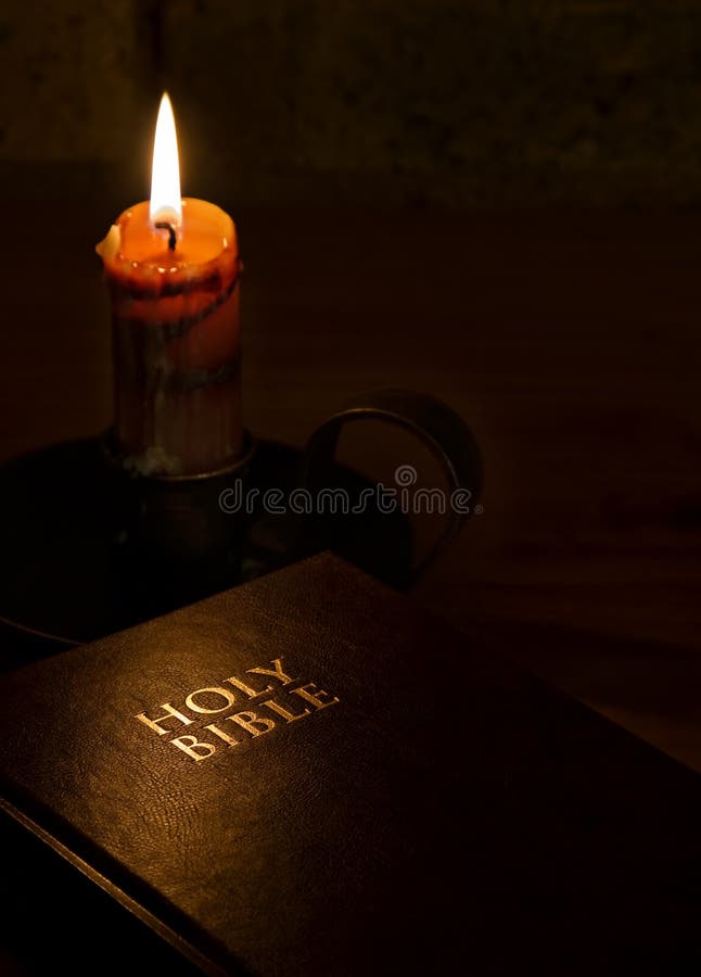 The Holy Bible By Candlelight Royalty Free Stock Photography Image