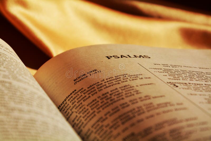 Opened pages of the holy book, reading the holy Bible, background. Religious image. Opened pages of the holy book, reading the holy Bible, background. Religious image.