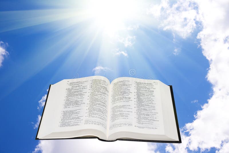 Holy Bible In The Sky Illuminated By A Sunlight Stock Image - Image