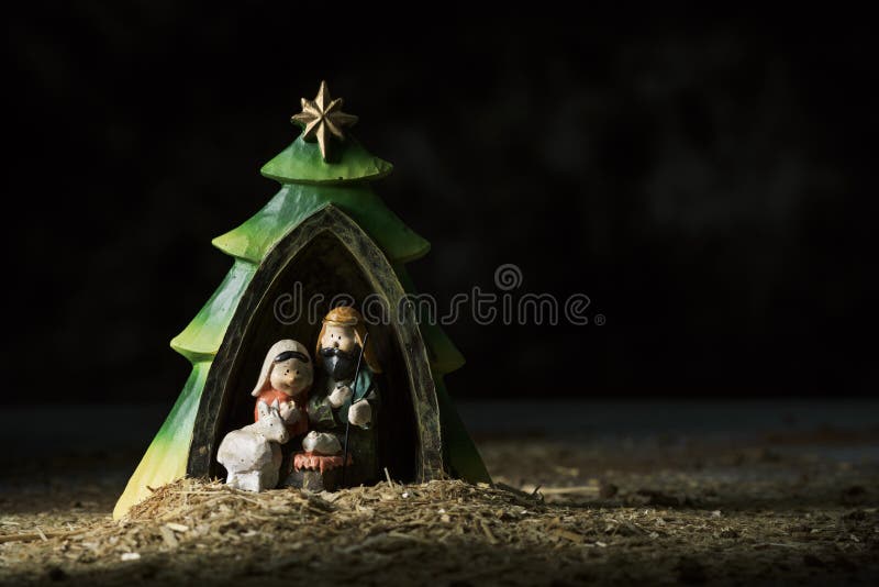 The Holy Family in a Rustic Nativity Scene Stock Photo - Image of ...
