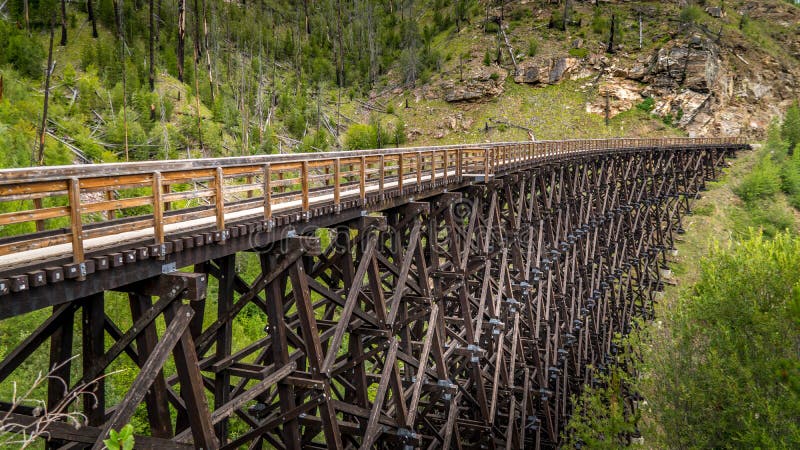 One of the 18 Wooden Trestle Bridges of the abandoned Kettle Valley Railway in Myra Canyon near Kelowna, British Columbia, Canada. One of the 18 Wooden Trestle Bridges of the abandoned Kettle Valley Railway in Myra Canyon near Kelowna, British Columbia, Canada