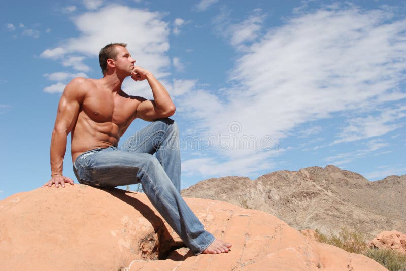Hombre con vaqueros azules foto de archivo libre de regalías