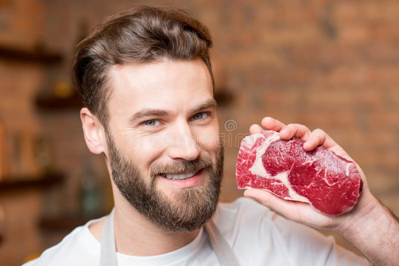 Hombre con la carne fotos de archivo libres de regalías Hombre con la carne fotos de archivo libres de regalías
