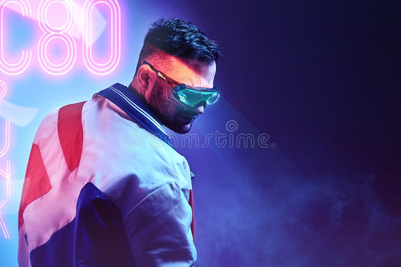 Handsome cyborg man wearing modern clothes and futuristic smart vision glasses. Cyberpunk concept art. Handsome cyborg man wearing modern clothes and futuristic smart vision glasses. Cyberpunk concept art