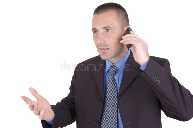 Hombre de negocios con el teléfono celular fotografía de archivo libre de regalías Hombre de negocios con el teléfono celular fotografía de archivo libre de regalías