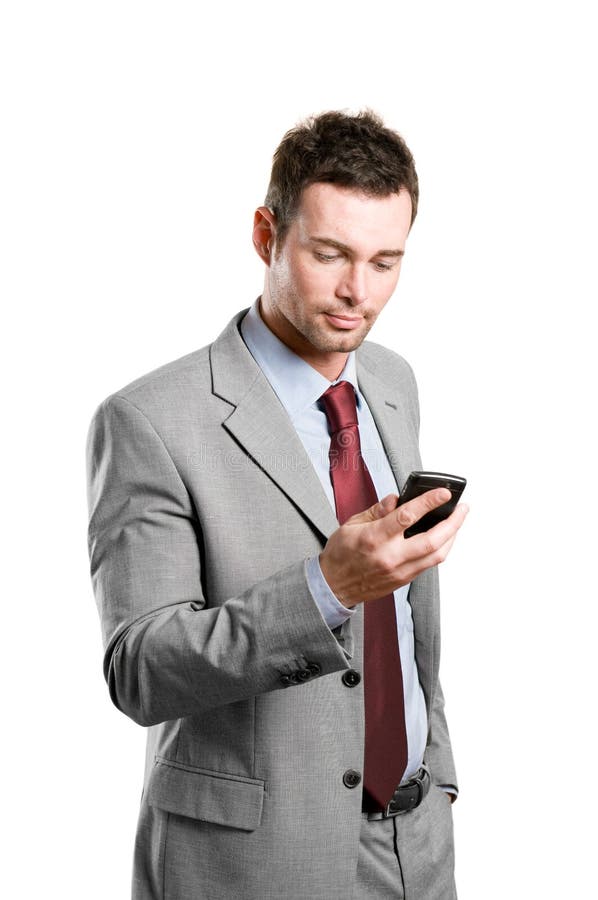 Hombre de negocios con el teléfono móvil del pda foto de archivo Hombre de negocios con el teléfono móvil del pda foto de archivo