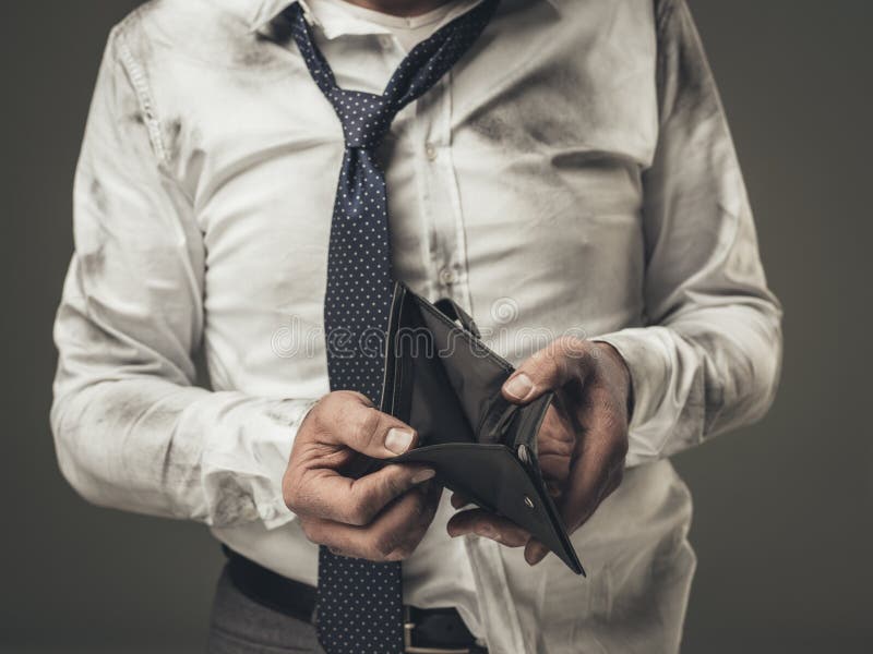Hombre de negocios desempleado con la cartera vacía fotografía de archivo libre de regalías Hombre de negocios desempleado con la cartera vacía fotografía de archivo libre de regalías