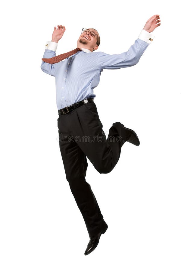 Hombre de negocios feliz que salta en el aire foto de archivo