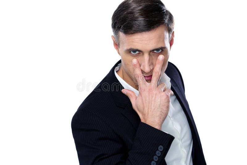 Hombre de negocios que hace la observación de usted gesticular foto de archivo libre de regalías Hombre de negocios que hace la observación de usted gesticular foto de archivo libre de regalías