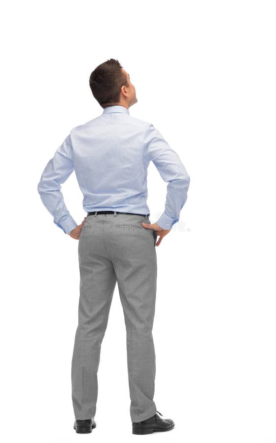 Hombre de negocios que mira para arriba de la parte posterior imágenes de archivo libres de regalías