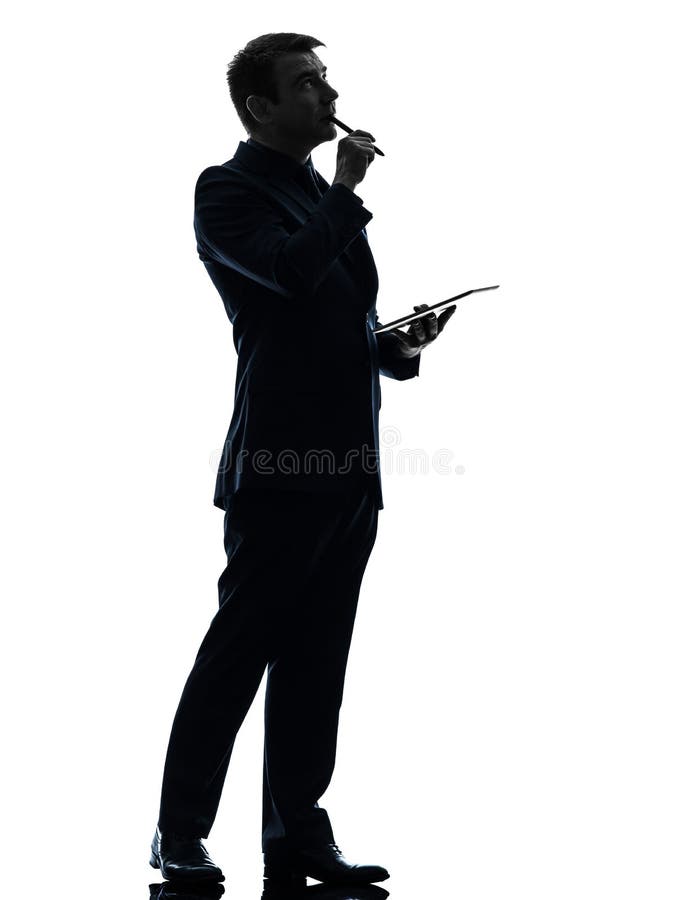 Hombre de negocios que piensa la silueta digital pensativa de la tableta imagenes de archivo Hombre de negocios que piensa la silueta digital pensativa de la tableta imagenes de archivo