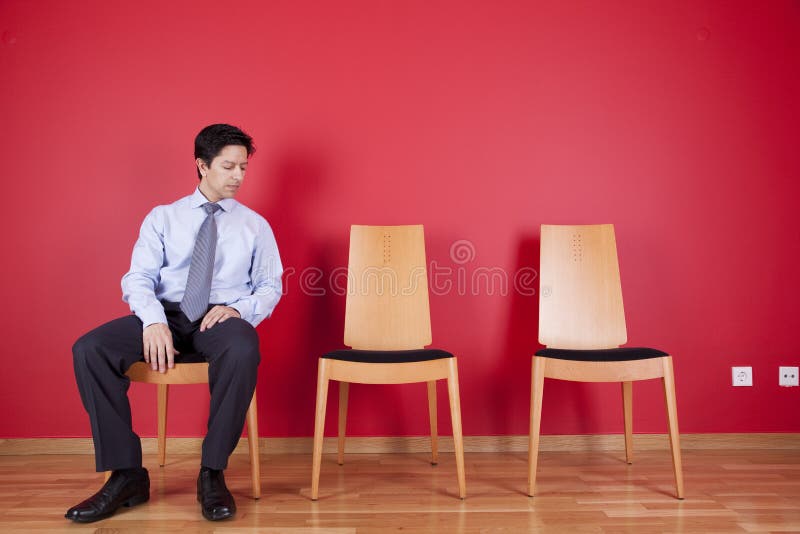 Hombre de negocios que se relaja imagen de archivo Hombre de negocios que se relaja imagen de archivo