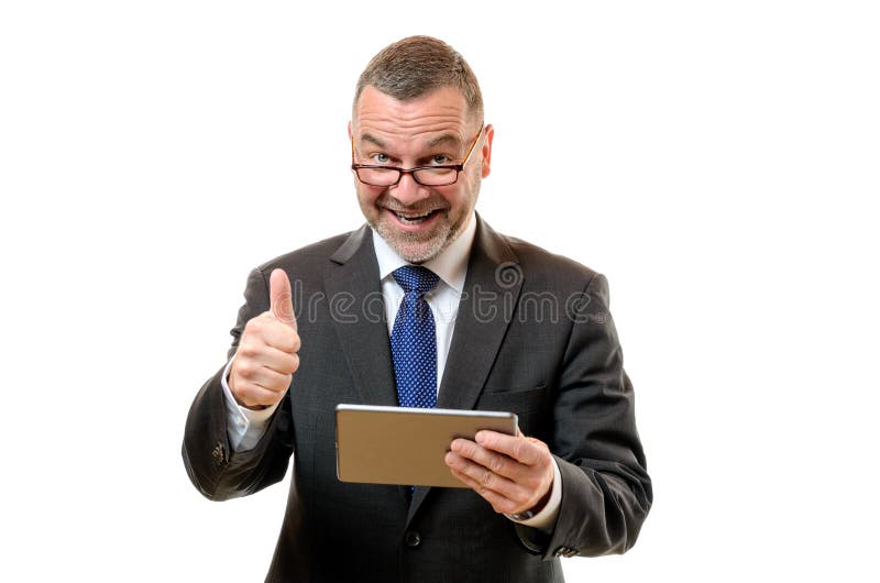 Hombre de negocios que señala su éxito y aprobación fotografía de archivo Hombre de negocios que señala su éxito y aprobación fotografía de archivo