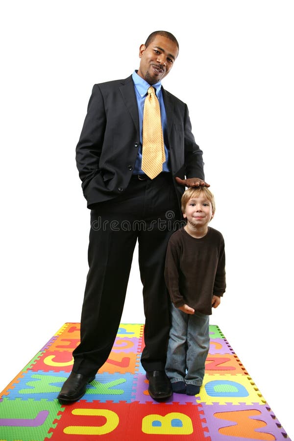 Hombre de negocios y niño fotografía de archivo libre de regalías Hombre de negocios y niño fotografía de archivo libre de regalías
