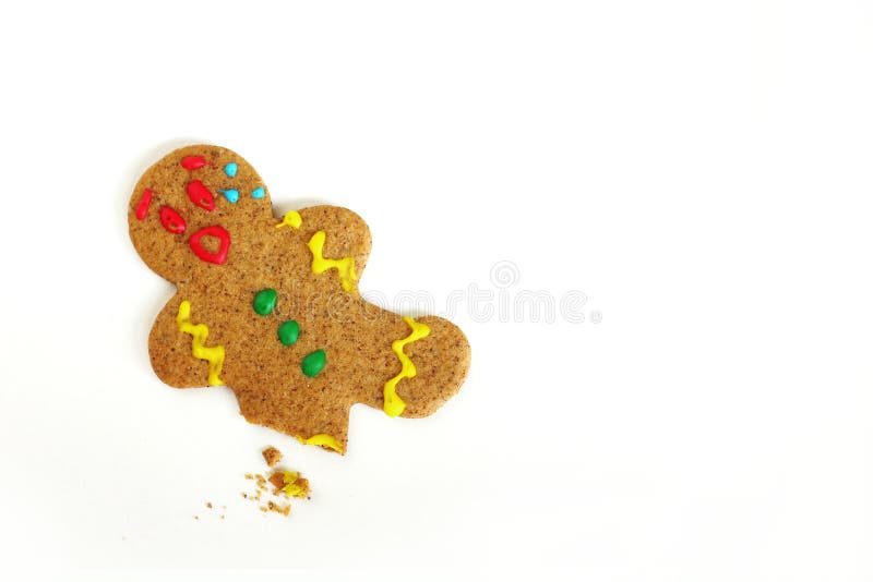 Hombre de pan de jengibre de la Navidad con la pierna quebrada fotografía de archivo Hombre de pan de jengibre de la Navidad con la pierna quebrada fotografía de archivo