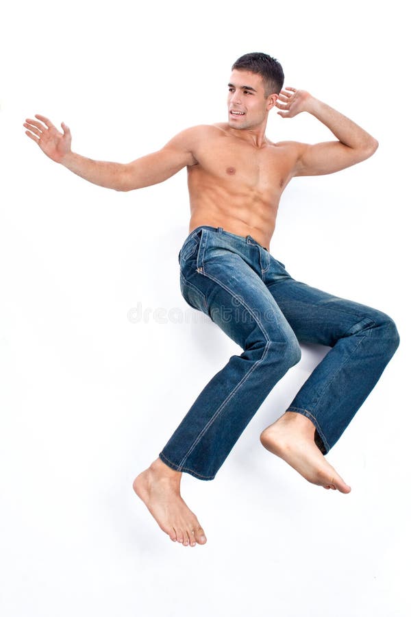 Hombre con vaqueros azules imagen de archivo