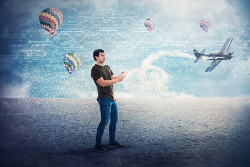 Hombre joven adicto que juega a los videojuegos 3d que se divierten en el mundo de la realidad virtual foto de archivo Hombre joven adicto que juega a los videojuegos 3d que se divierten en el mundo de la realidad virtual foto de archivo