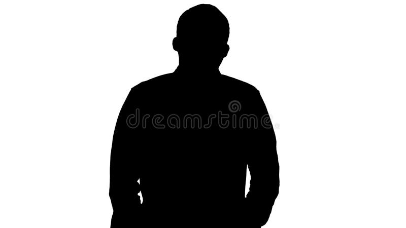 Medium shot. Silhouette Young man walking and whistling. Professional shot in 4K resolution. 004. You can use it e.g. in your commercial video, business, presentation, broadcast. Medium shot. Silhouette Young man walking and whistling. Professional shot in 4K resolution. 004. You can use it e.g. in your commercial video, business, presentation, broadcast