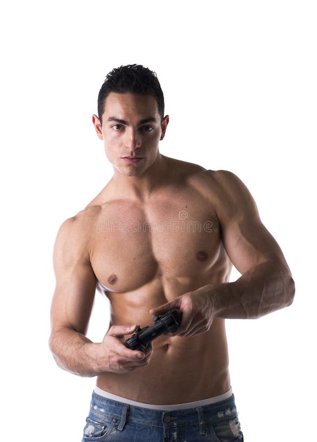 Hombre joven que juega a un videojuego con la palanca de mando en manos fotos de archivo libres de regalías Hombre joven que juega a un videojuego con la palanca de mando en manos fotos de archivo libres de regalías