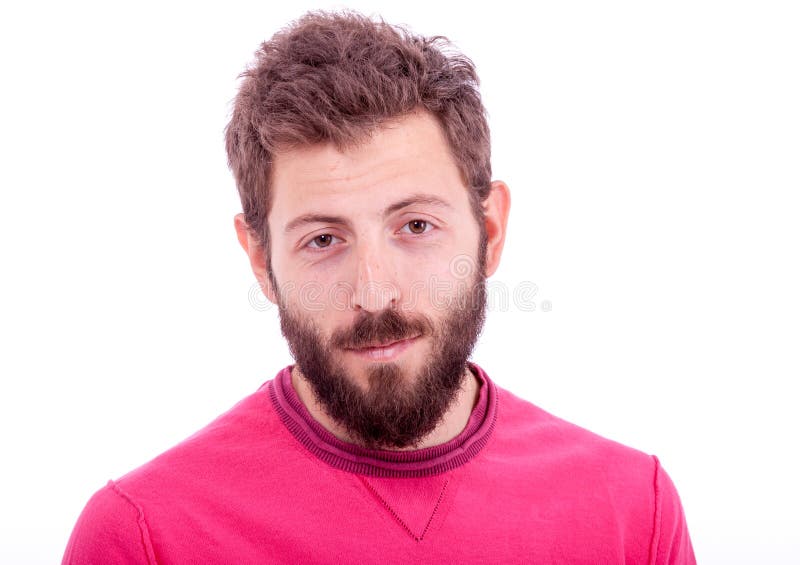 Hombre joven sonriente con la presentación de la barba imágenes de archivo libres de regalías Hombre joven sonriente con la presentación de la barba imágenes de archivo libres de regalías