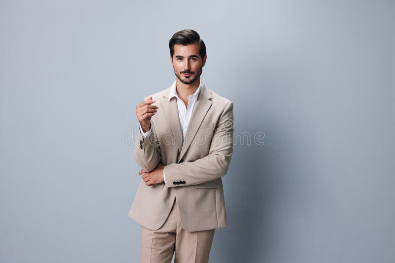 Hombre negocios hombre apuesto retrato éxito adecuado para el espacio de copias sonriente feliz beige foto de archivo