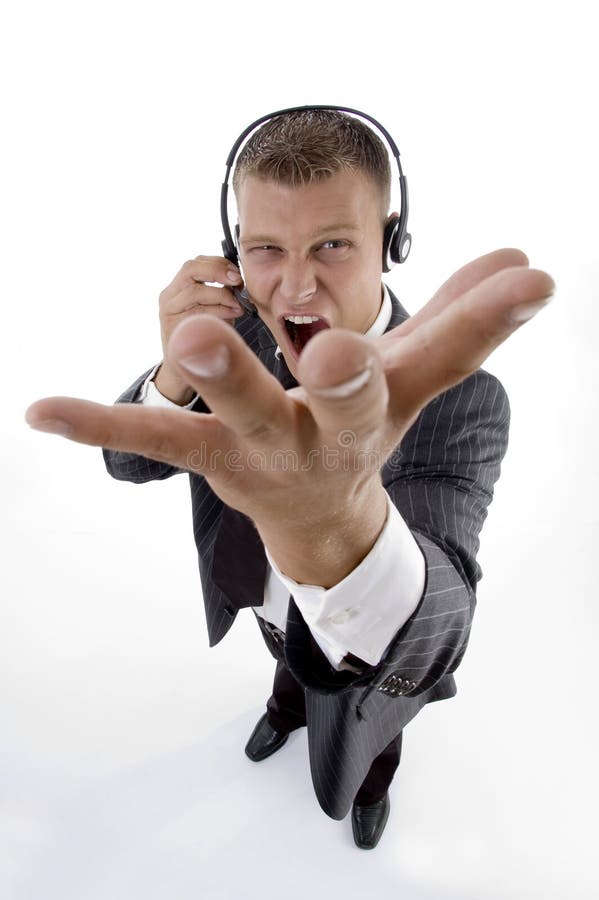 Hombre que grita en llamada de teléfono foto de archivo Hombre que grita en llamada de teléfono foto de archivo