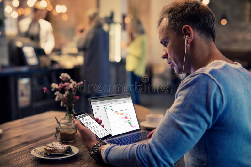 Hipster man working in cafe. Hipster man working in cafe