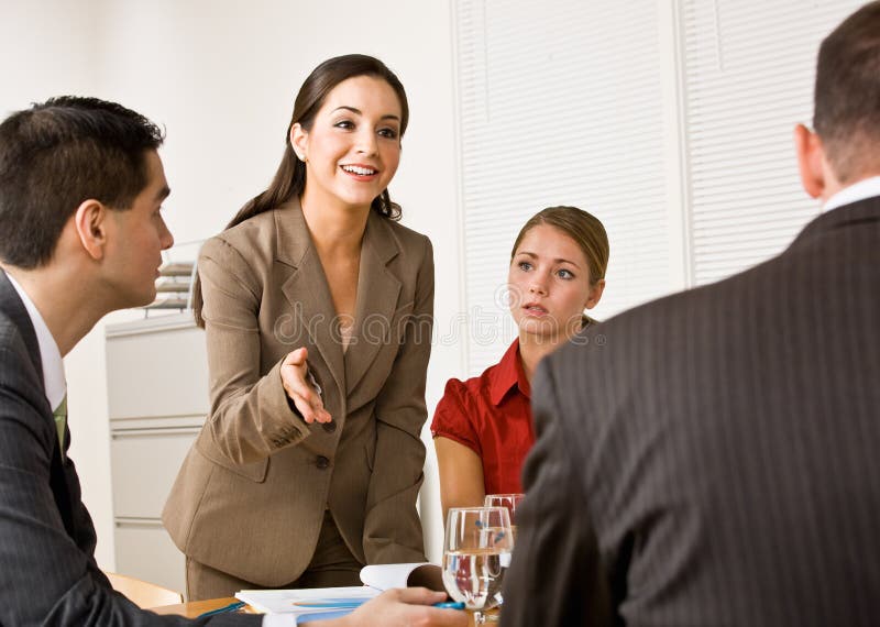 Hombres De Negocios En Una Reunión Imagen de archivo Imagen de veinte