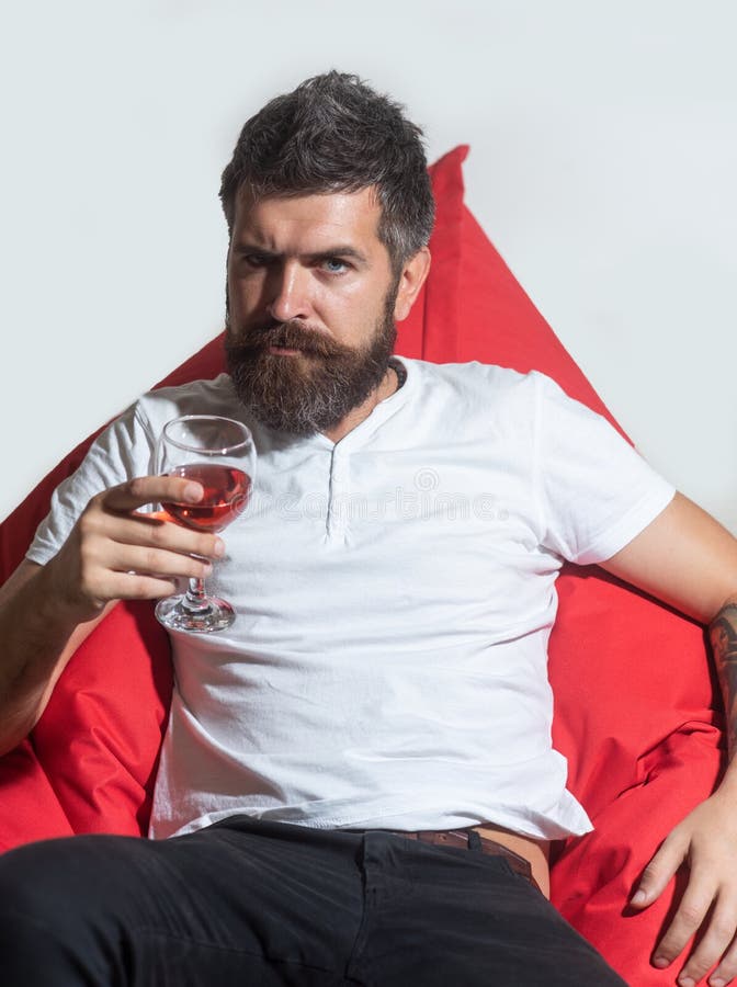 Home Alone Party. Hipster with Glass of Wine. Man with Alcohol. Stock