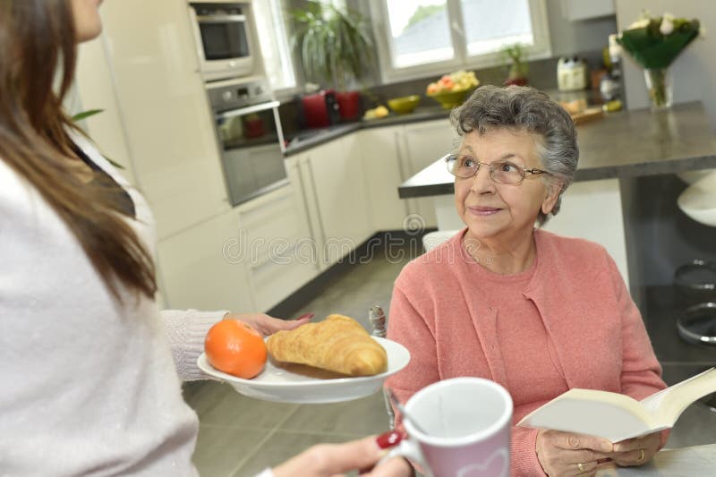 Home Carer With Elderly Person In Town Stock Image - Image of home ...