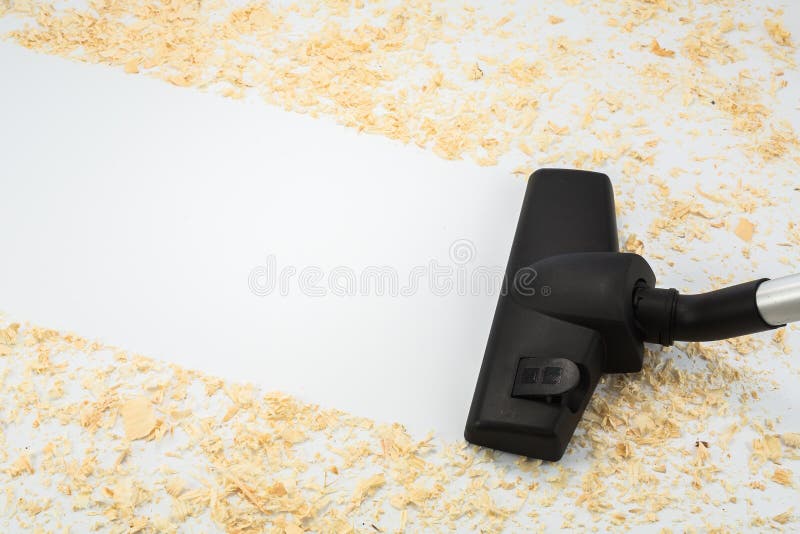 Home Cleaning with a Vacuum Cleaner after the Builders Stock Photo