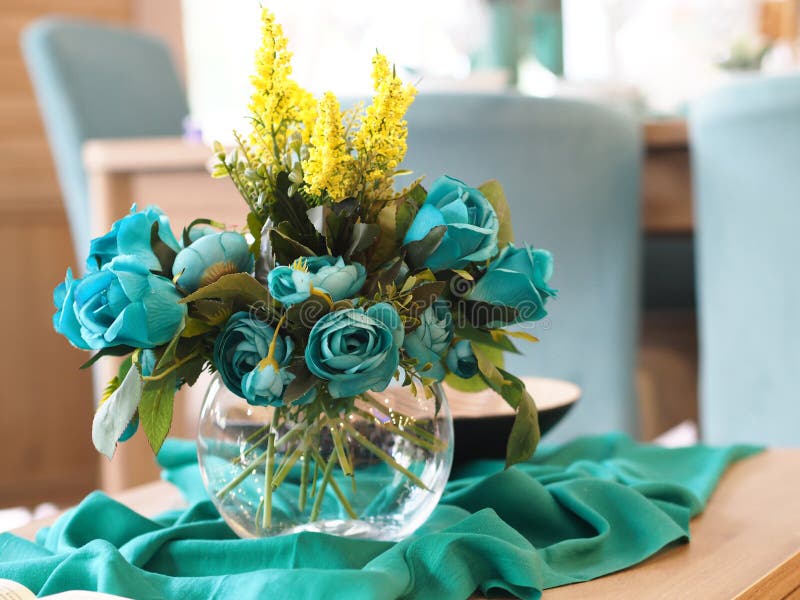 Home decor, blue flowers in the vase on the table stock photos Home decor, blue flowers in the vase on the table stock photos