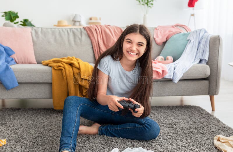 Having Fun at Home. Cheerful Black Teen Guy with Joystick Playing Online  Computer Games, Sitting on Couch Indoors Stock Image - Image of computer,  person: 227478857