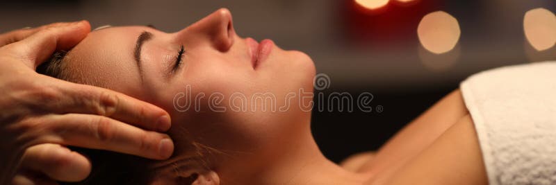 At home fingers massage head to beautiful girl stock photography At home fingers massage head to beautiful girl stock photography