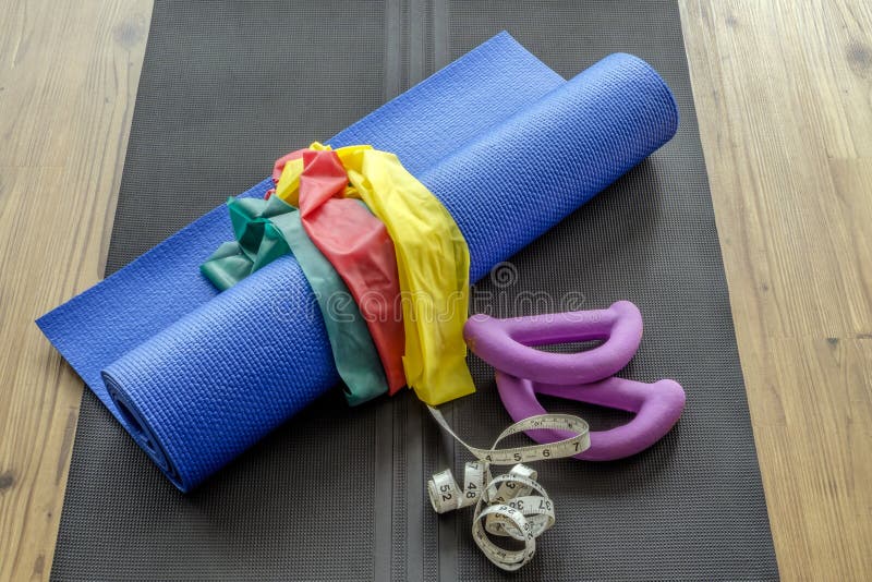 Home Fitness Accessories on Yoga Mat Stock Photo - Image of hand ...
