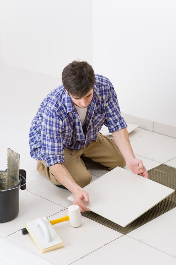 Floor tiles installation stock photo. Image of busy, modern 3511538