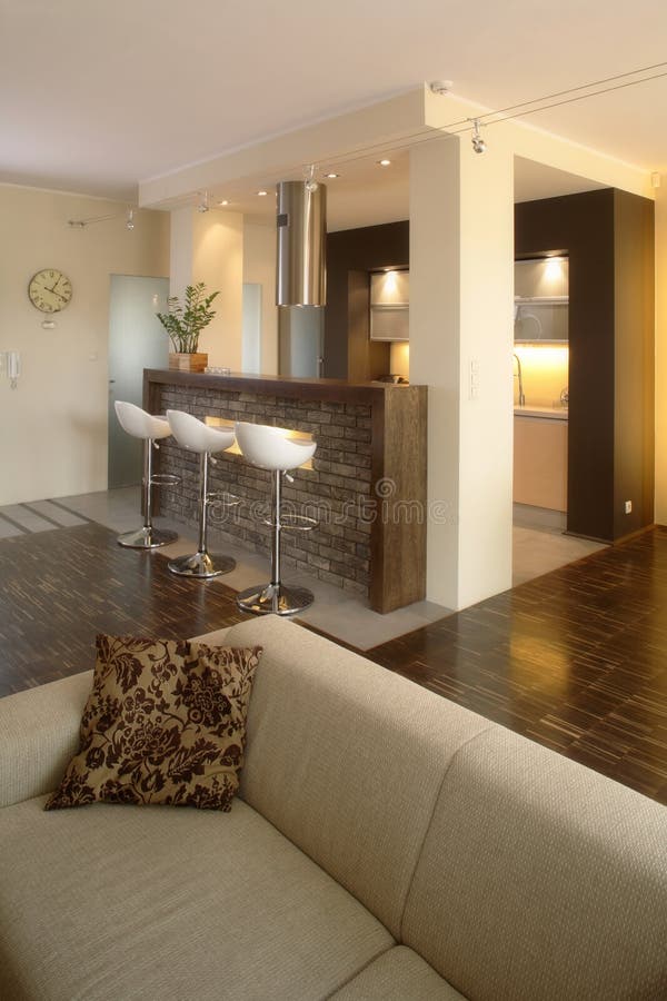 Interior view of the an open home living room in a modern apartment. Interior view of the an open home living room in a modern apartment.