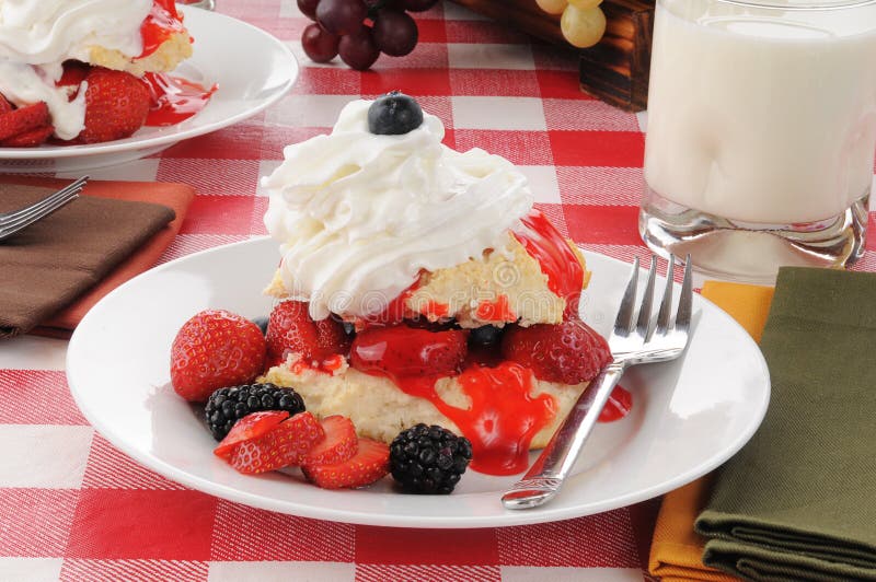 Home made strawberry shortcake on a picnic table