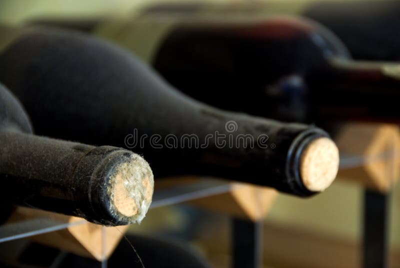 Home made wine stacked on a rack stock image