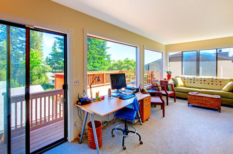 Home office and living room house interior with balcony view. royalty free stock image Home office and living room house interior with balcony view. royalty free stock image